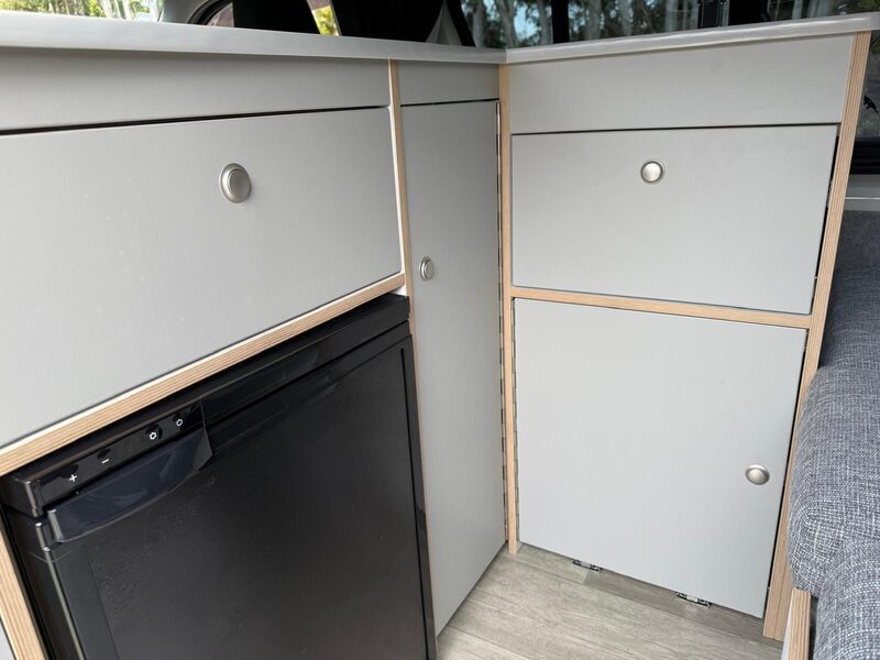 The 82 litre fridge and cupboard storage built into Harriet's rear cabinetry