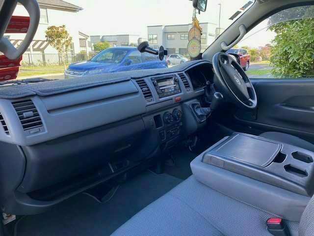 Driver cab and dashboard of the Toyota Hiace campervan, easy to drive